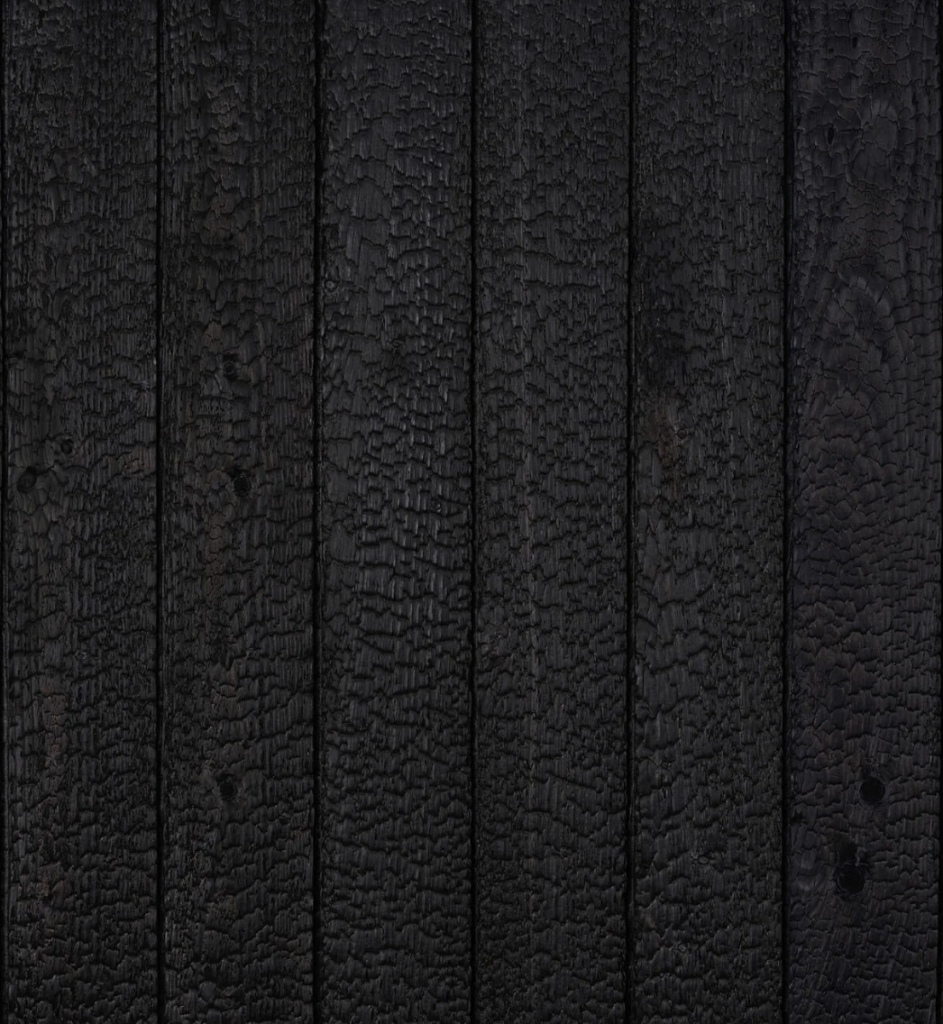 Bardage en bois mélèze brûlé charbon noir intense